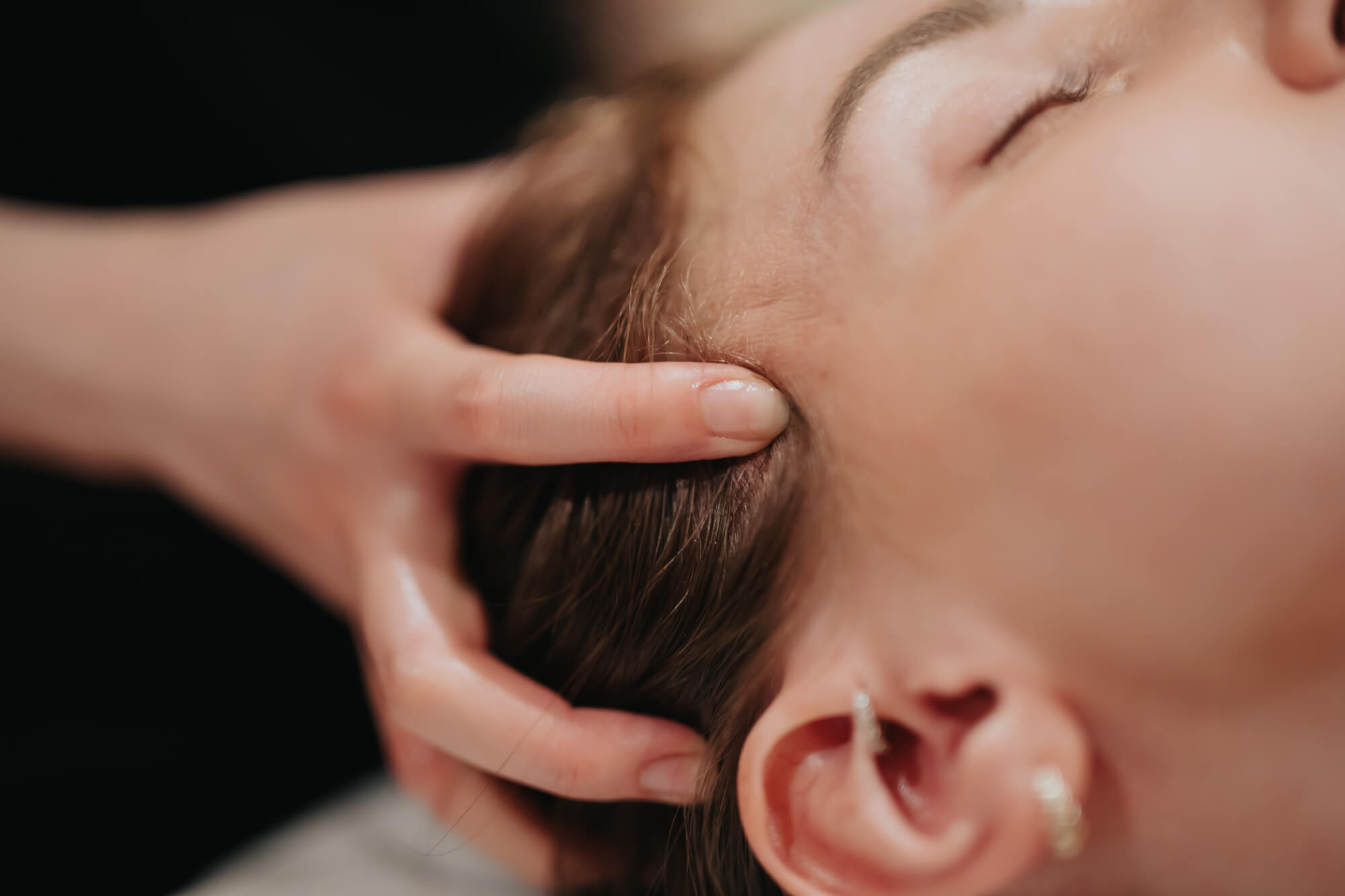 Closed up of a woman's head massage