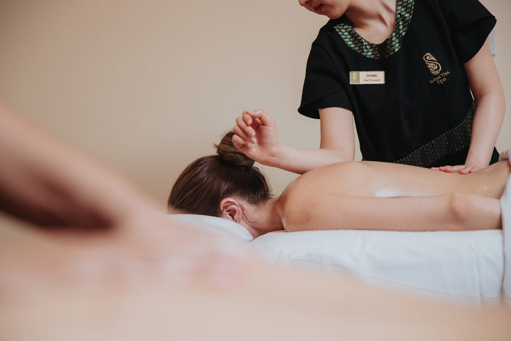 Registered Massage therapist performing true wellness spa.