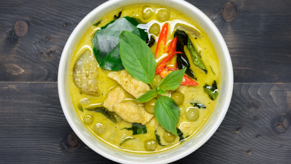 Thai Curry in Wooden table