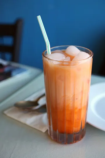 This Thai drink is served cold topped with a pinch of milk.