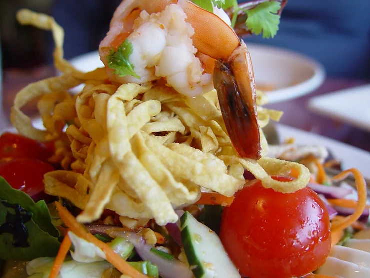 Yum Yai, also referred to Thai salad, is usually a varied combination of vegetables, herbs and spices.